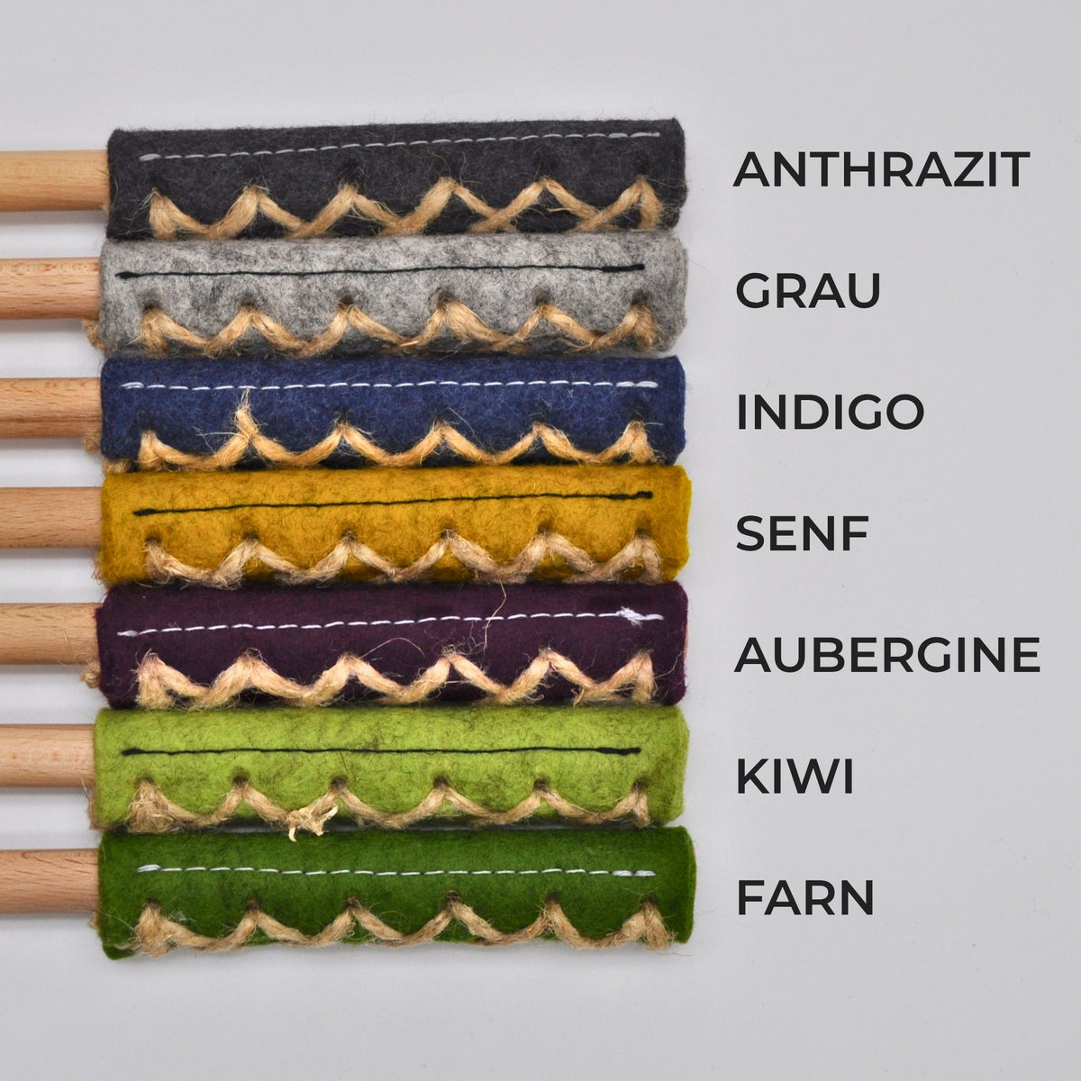 Die fünf Farbvarianten der Katzenangel Wildfang: Anthrazitgrau, Indigo, Senf, Aubergine und Kiwi